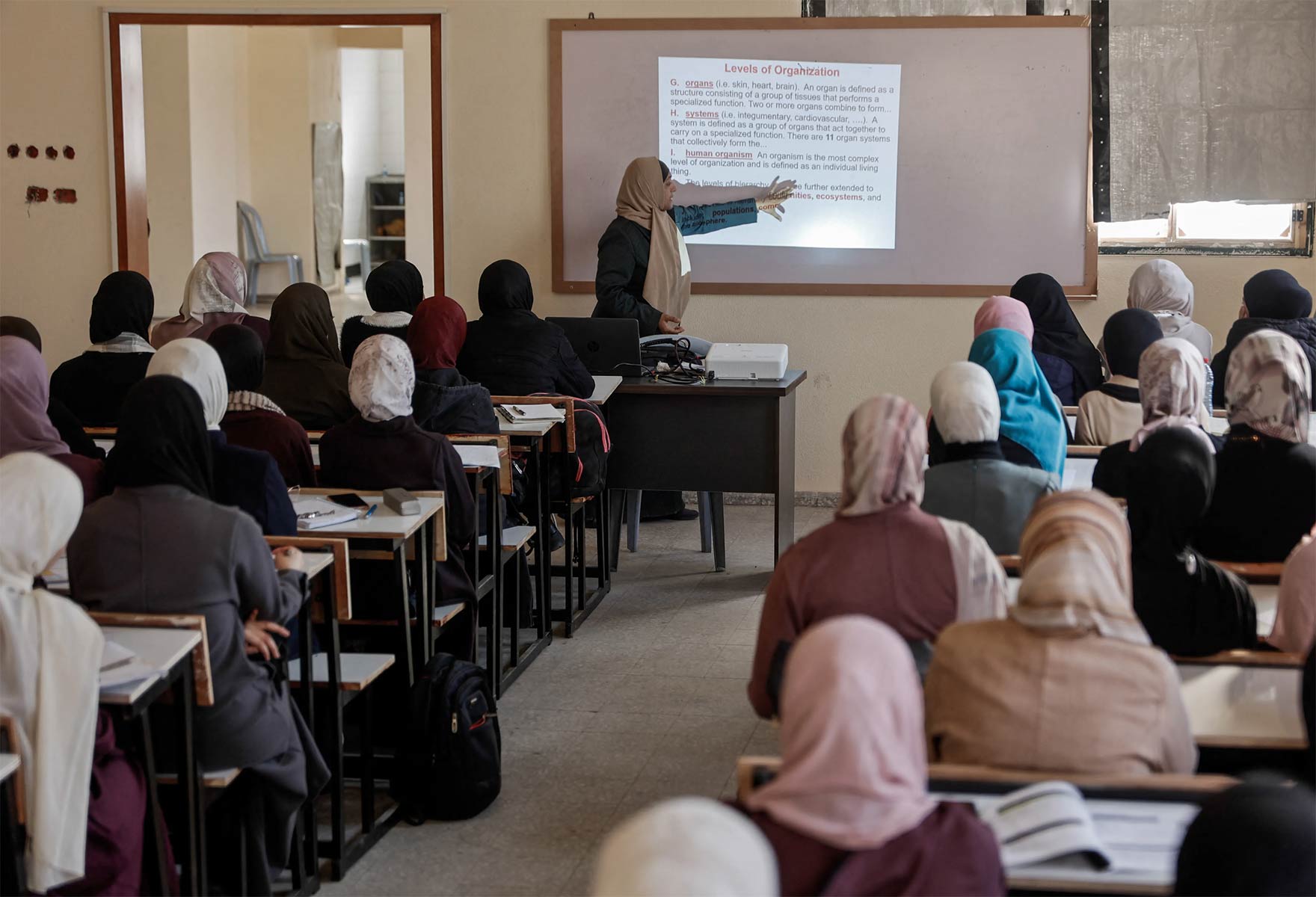 Women Students attend classes at the Islamic University of Gaza